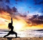 10633948-beautiful-woman-silhouette-doing-virabhadrasana-i-warrior-pose-on-the-sand-beach-and-ocean- (1)